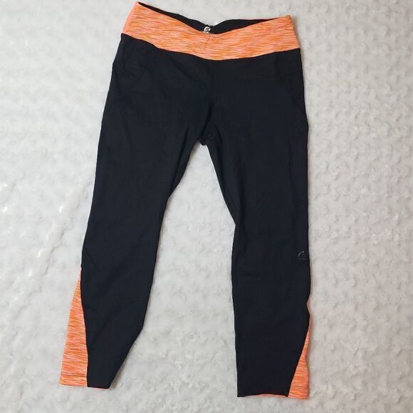 Road Runner Sports size small running capris with orange space dye accents - Picture 1 of 5